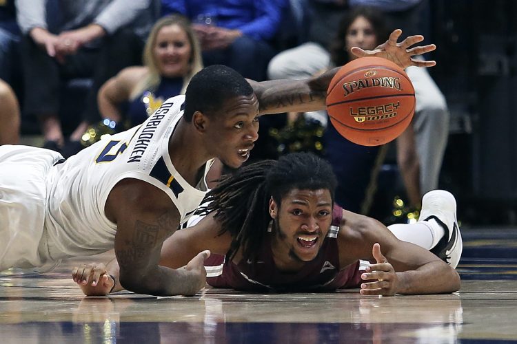 McNeil, Sherman Lead WVU to Win